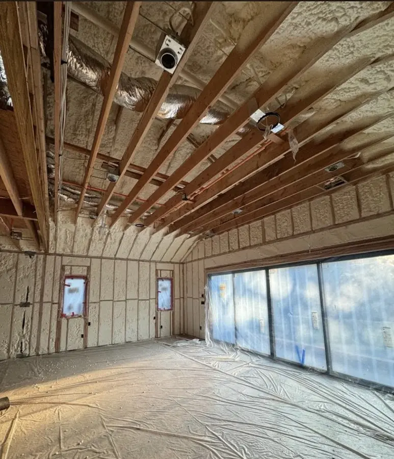 Interior walls and ceiling insulated with spray foam during new construction in Fort Smith